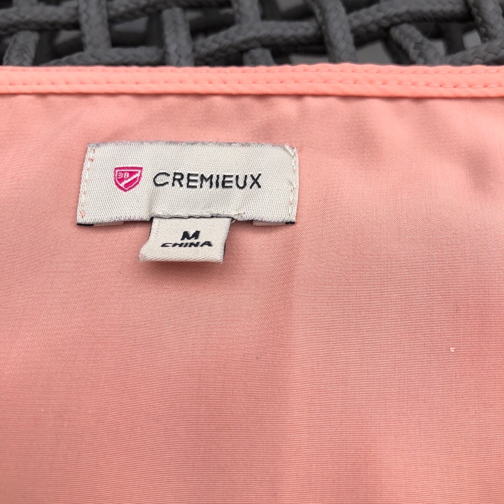 Long-sleeve lightweight peachy tunic.